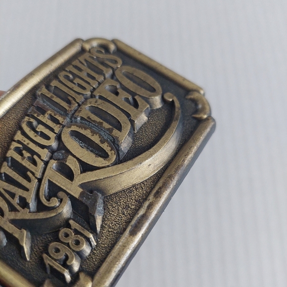 Vintage 1981 Raleigh Lights Rodeo Belt Buckle Brass - Picture 3 of 3